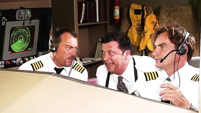 Three hot pilots laughing in cockpit, XXX flight parody boobs inflation