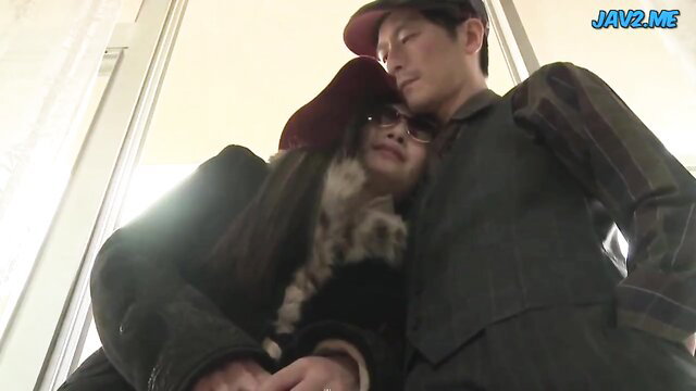 Kobayakawa Reiko cuddles intimately with man in coats, JAV affair scene