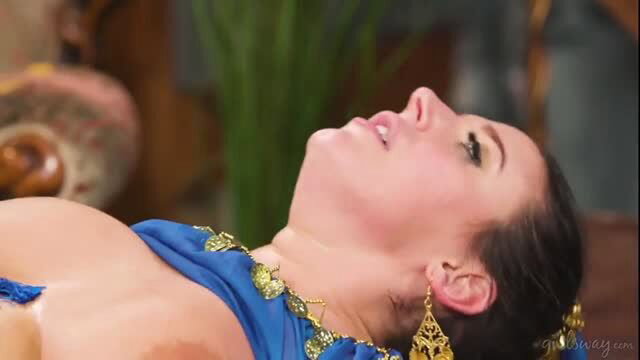 Angela White as sexy lesbian genie in blue outfit, topless tease