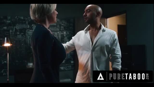 Busty Dee Williams in black blazer teases shirtless man in office Pure Taboo scene