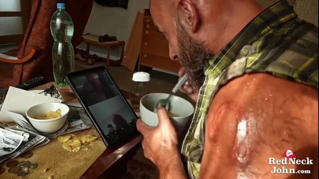 Redneck John eating with huge glistening muscles, shirtless in plaid